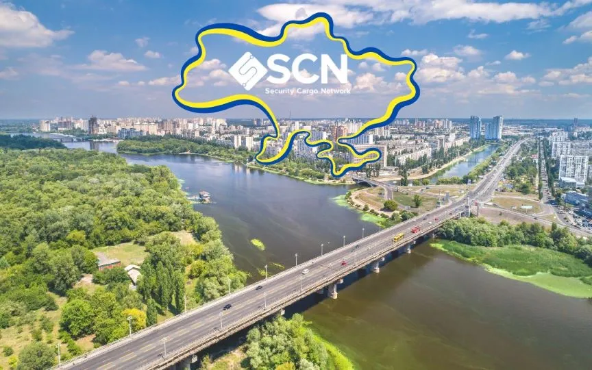 SCN Вид на Київ через Дніпро з логотипом компанії Security Cargo Network