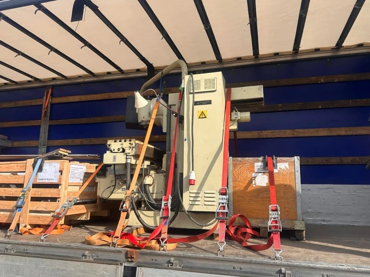 Industrial cargo secured on flatbed trailer
